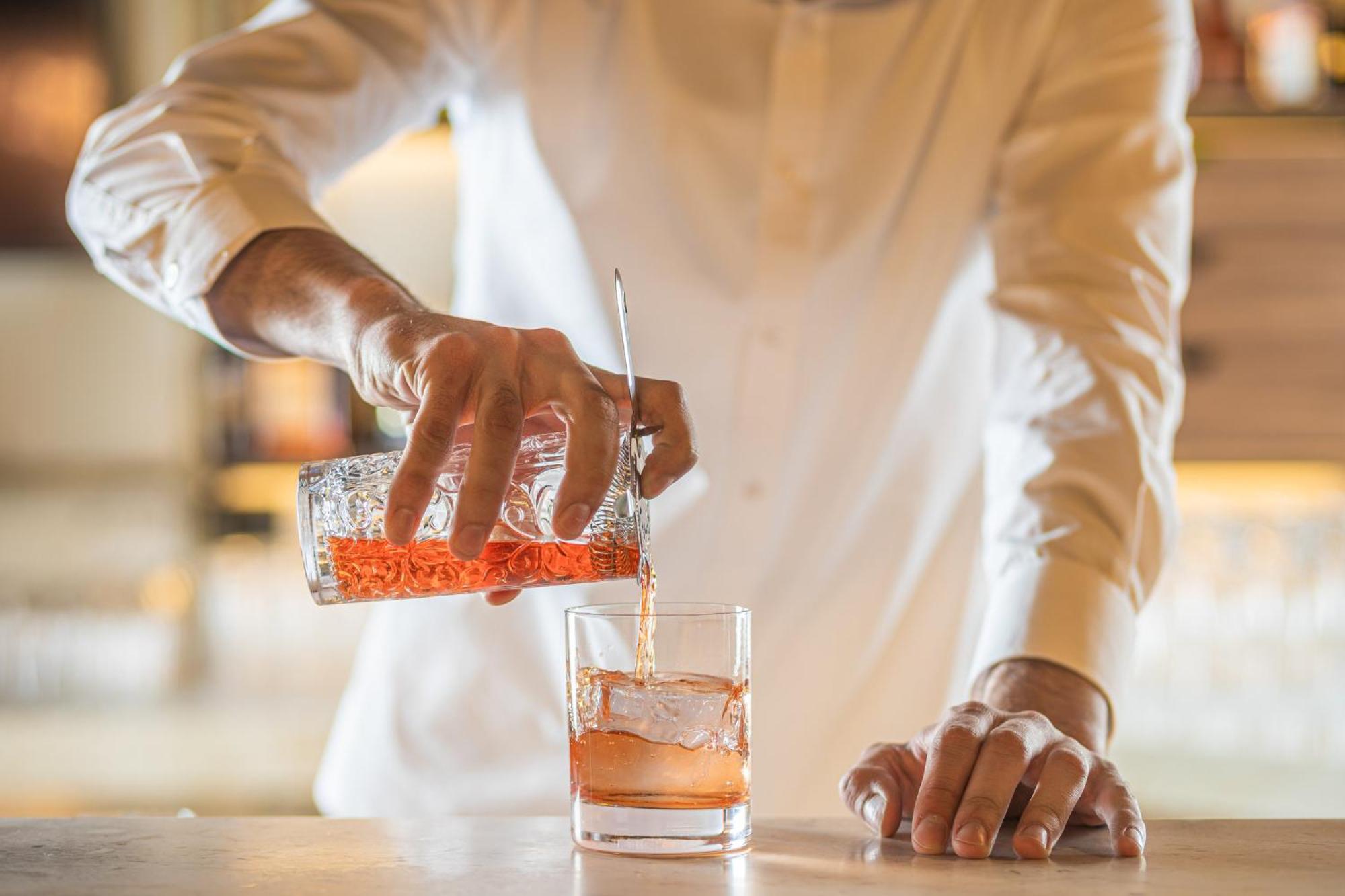 Viceroy Kopaonik Serbia Eksteriør bilde A bartender stirring a cocktail